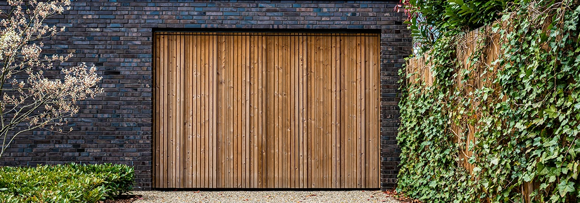 Amarr Traditional Garage Doors Tracks Repair in Fontainebleau, Florida