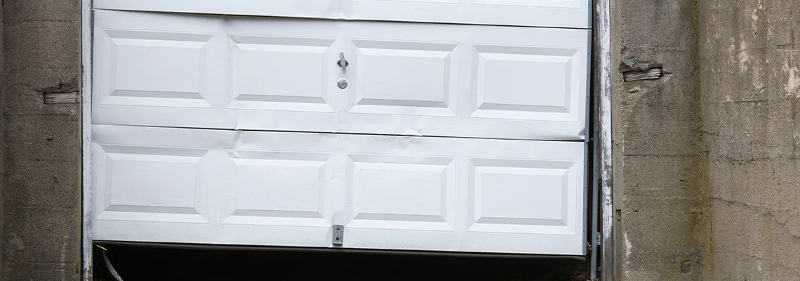 Garage Door Got Hit By A Car Dent Removal in Fontainebleau, FL