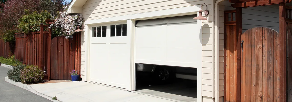 Fix Metal Garage Door Jerking in Fontainebleau, Florida